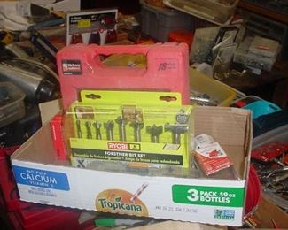 Boxes of router bits and accessories