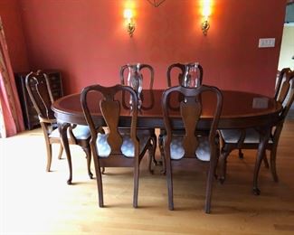 Queen Anne style dining table and six Queen Anne style chairs