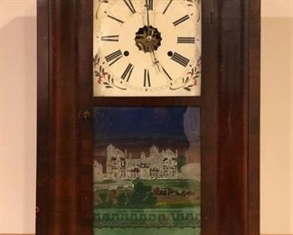 Antique mahogany Ogee mantle clock.