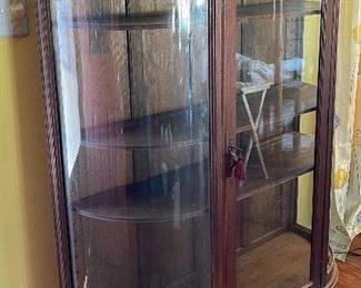 Antique Oak Curved Glass Curio Cabinet	59.5x46x16in	HxWxD