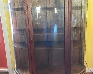 Antique Oak Curved Glass Curio Cabinet	59.5x46x16in	HxWxD