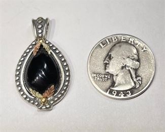 Coleman C.Co Black Hills 10k Gold Onyx Pendant	10k/.925	
