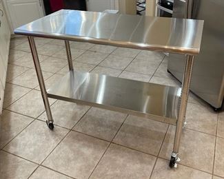 Trinity Stainless Steel NSF Rolling Kitchen Cart CTLS-0201c-1	39x24x48in	HxWxD
