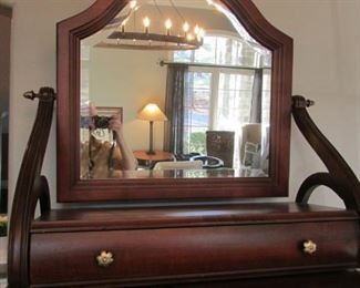 Large mahogany finished dressing mirror.  H 29”, W 28”, D 11 5/8” $125
