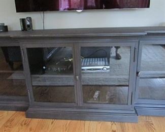 Restoration Hardware gun metal finished metal media cabinet. H 32 ½”, W 80”, D 22 1/2” $650