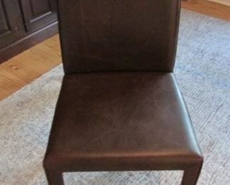 Crate and Barrel Folio brown leather side chair. H 36”, W 18”, D 18” $125