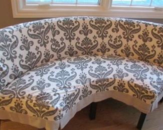 Quatrine half circle dining bench with three chairs. Linen slipcovers. Bench H 33 ½”, W 71”, D 21”, chair H 34”, W 20”, D 21” $650