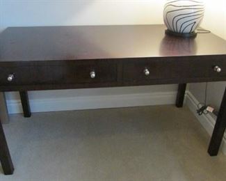 Hickory Chair Thomas O’Brien Collection rosewood finished desk. Wear to the edges of the top and legs. H 30 ½”, W 58”, D 28” $200