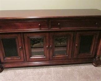 Thomasville mahogany media cabinet.  Scratches on top.  H 33", W 66”, D 19 ½”. $300
