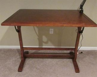 Cherry finished drafting desk. H 34”, W 42”, D 30” $130