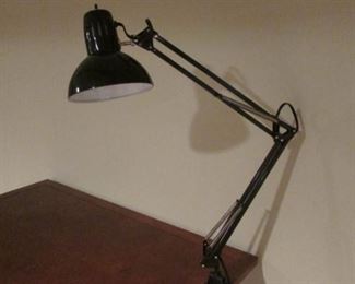 Black metal clip on desk lamp. H 27” $20