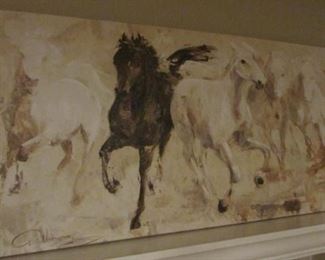 Print of canvas of horses. 20” x 39 ¼” $30