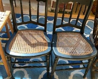 #43 (2) Black wood Chairs w/cane Seating - sold as a pair $50.00