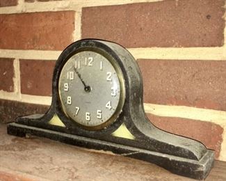 very old antique mantle clock