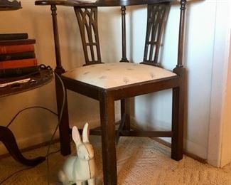 Corner chair and cast iron bunny rabbit 