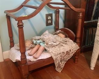 doll and doll bed