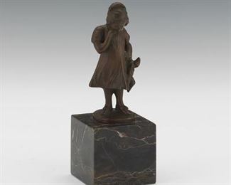 Bronze Figurine of a Girl Holding a Harlequin Doll