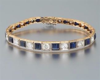 Ladies Art Deco Platinum, Gold, Blue Sapphire and Diamond Bracelet 