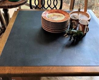 This table folds like a card table.