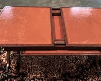 Expandable leather-top coffee table 