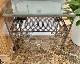 $125 - Woodard glass and powder-coated iron one shelf table with safety glass;  24"H x 24.5"W x 16.5"D