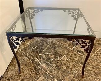 $140; Vintage square indoor/outdoor iron table with glass top; 17.5"H x 24.5"W x 24.5"D