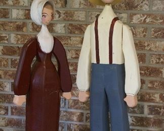 Wooden farmer and wife figures