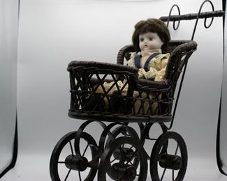 Porcelain Doll and Buggy 