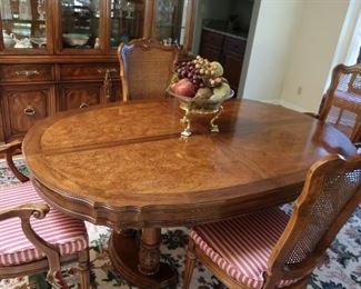 #1  dining  room  set  by  White--table  has  2  leaves, pads and  8  chairs  Table  is  69 3/4"  x  45"  Leaves  are  20"  ea.              995.00  for  the  complete  set  which  includes  china, server, table and chairs
