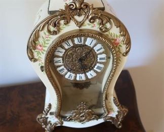 #8    Clock  made  in  switzerland- german  wind  up   Urgos  Schlagwerk    Price  is  100.00   