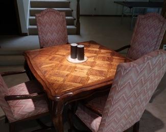 #31     Century game table  and  four  chairs   Table  is  42  x  42     