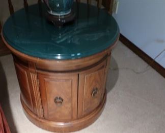 #36        lamp  table  with round green marble top    24"  diameter.      