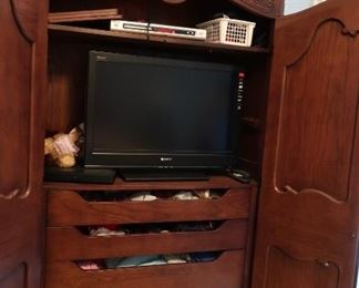 inside  of  Henredon  armoire-  no  television  for  sale