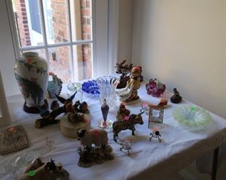 another  view  of  table with  glass, plates,  hummel