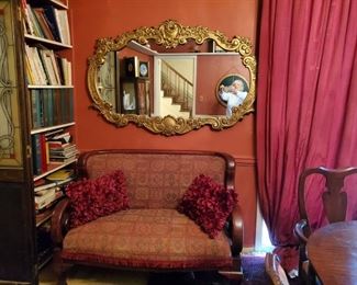 Loveseat and beautiful gilded mirror