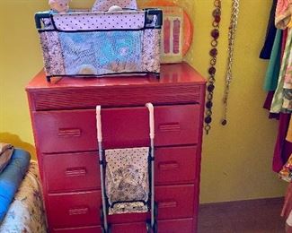 Cute red painted dresser.