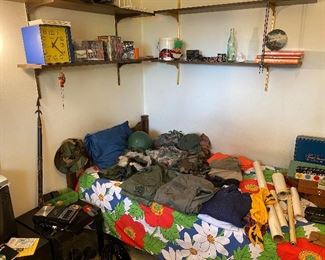 Military clothing including a  WWII helmet.