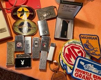 Lighters, patches & belt buckles.