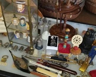 pin cushion gold thimbles
charming bone pin cushion
owl thimble holder
sterling button hokoks