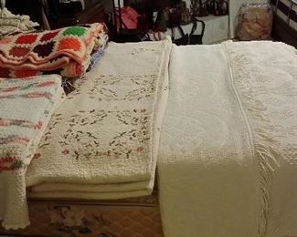 Variety of bedspreads, comforters, & afghans 