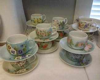 Hand painted cups & saucers