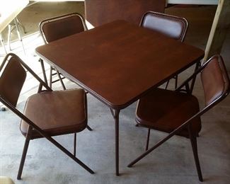 There are 2 card tables with 4 chairs each (like new)