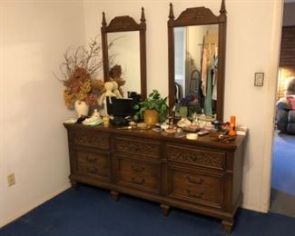 Master bedroom dresser has matching headboard and night stands