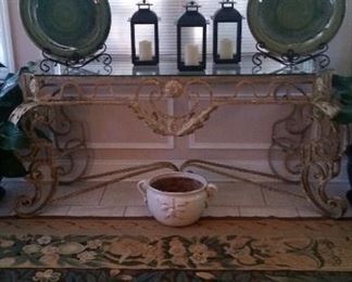 Stark Carpet, Iron Console table with glass top, pair of grand scale green earthenware chargers. Three lanterns with brand new batteries (lanterns never used) earthenware blanc de chine pot.