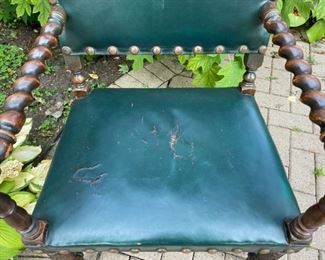 Green leather and barley twist wood armchair   225.00 wear on leather seat          37"h x 24"w x 26"d