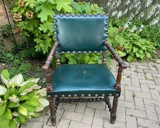 Green leather and barley twist wood armchair   225.00 wear on leather seat          37"h x 24"w x 26"d