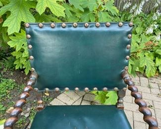 Green leather and barley twist wood armchair   225.00 wear on leather seat          37"h x 24"w x 26"d