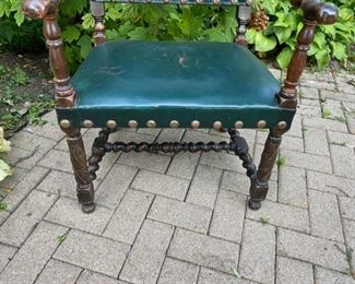 Green leather and barley twist wood armchair   225.00 wear on leather seat          37"h x 24"w x 26"d