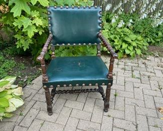 Green leather and barley twist wood armchair   225.00 wear on leather seat          37"h x 24"w x 26"d