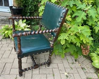 Green leather and barley twist wood armchair   225.00 wear on leather seat          37"h x 24"w x 26"d